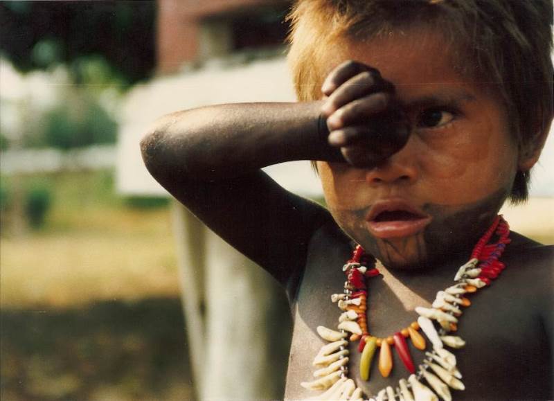 A native girl in Union de
                Choco with skin dyed from water fruit